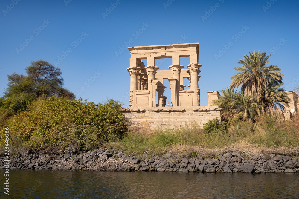Ruins of Temple of Aswan, Luxor, Egypt, as seen from the River Nile
