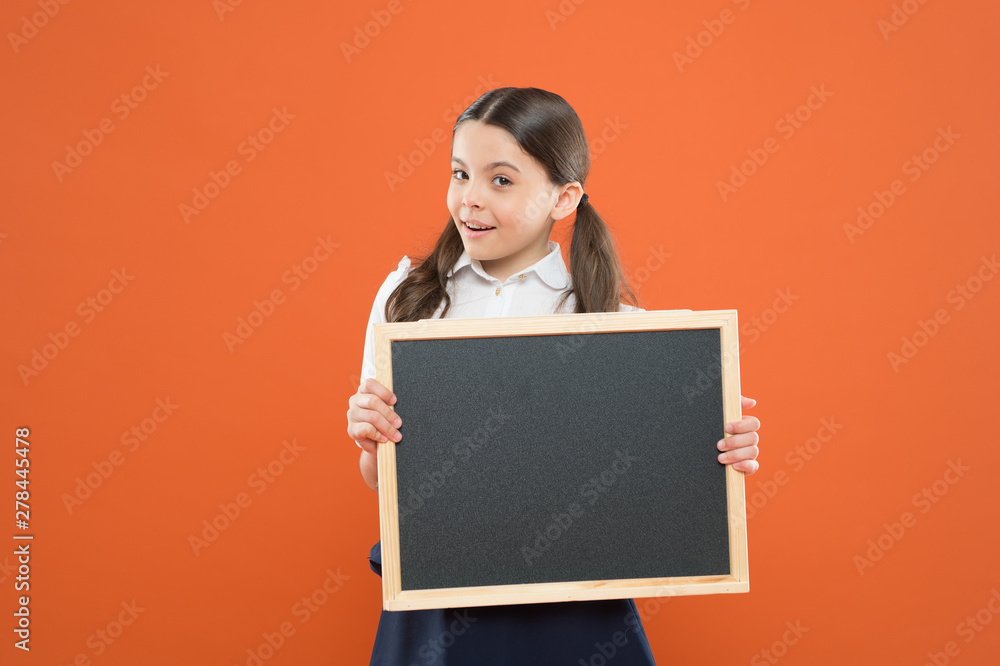 task list. write hometask. back to school. happy teachers day. 1 september. small girl demonstrate announcement. happy small school girl with chalkboard. blackboard for copy space. information task list. write hometask. back to school. happy teachers day. 1 september. small girl demonstrate announcement. happy small school girl with chalkboard. blackboard for copy space. information