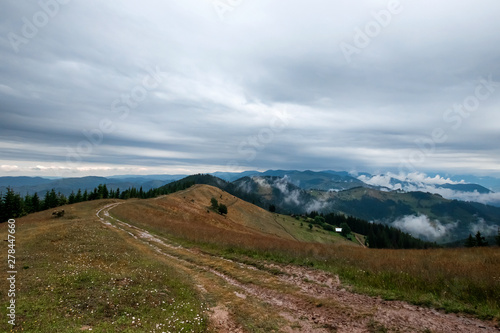 Mountain, beautiful summer landscape, road in the mountains, sky, summer. Ukraine, the Carpathian Mountains. Concept of travel, tourism, holidays, vacation