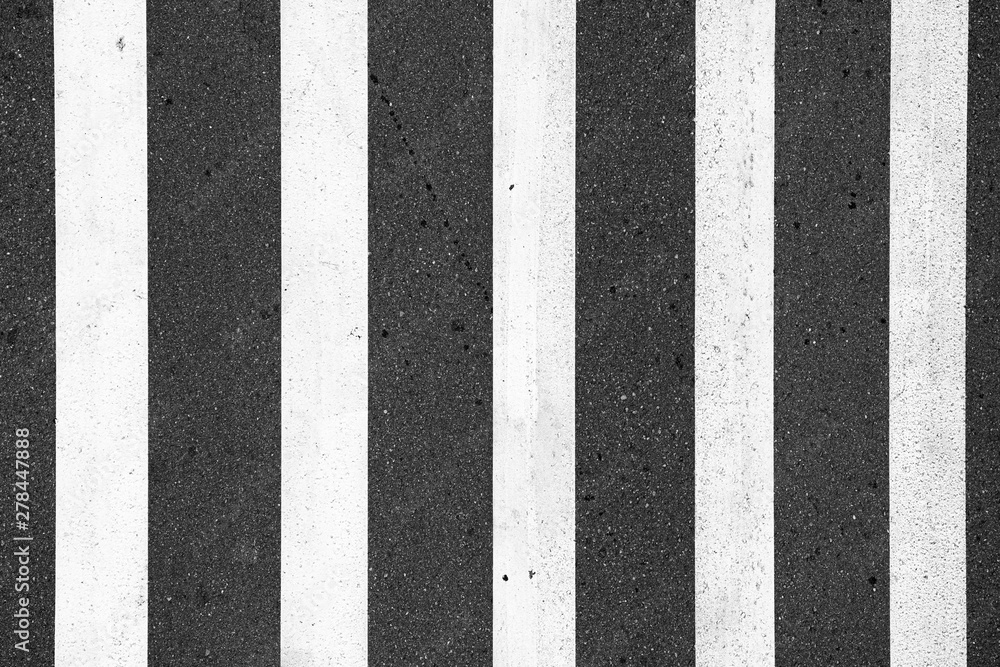 Fototapeta premium Zebra crosswalk on the road for safety when people walking cross the street.