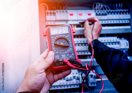 Fotografie Electrical measurements with multimeter tester