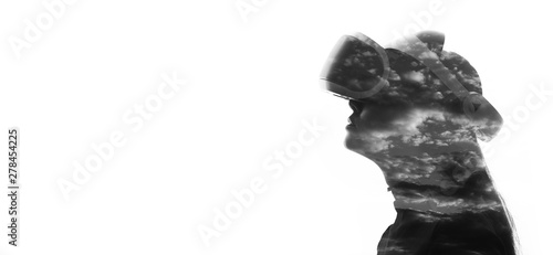 Double exposure of female face and sky. Abstract black and white woman portrait. Digital art. Augmented reality, game, future technology concept. VR. White background. Free space for text.