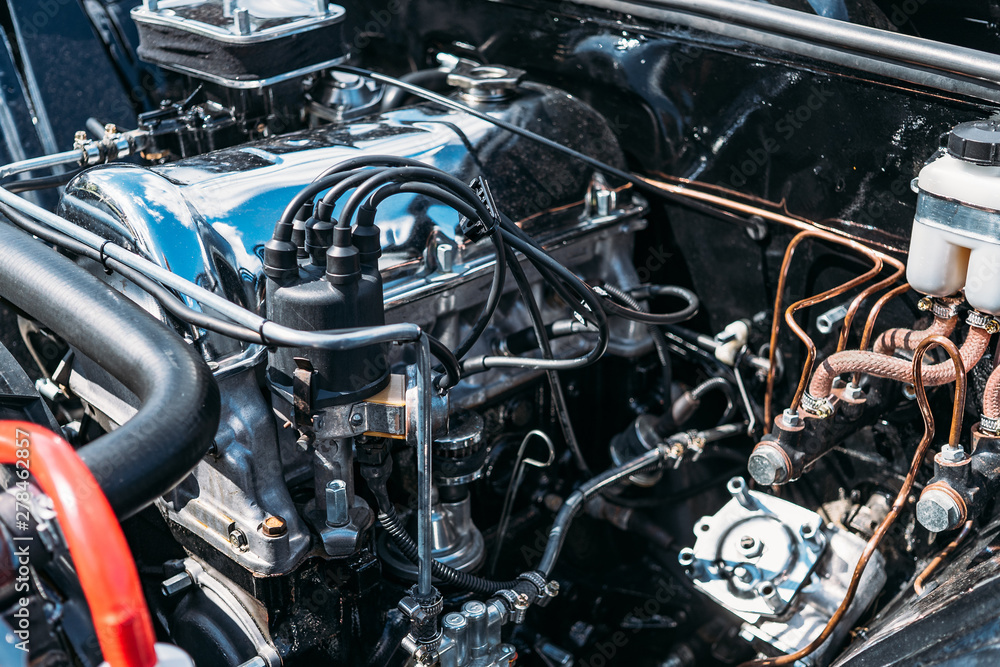 Tuned old classic car engine, sport auto vehicle motor, close up Tuned old classic car engine, sport auto vehicle motor, close up