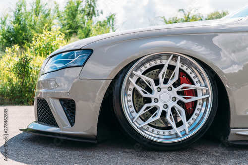 Photos Lowrider custom tuned sport car wheel with small rubber tyre and large disk