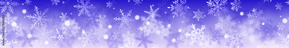 Christmas banner of complex blurred and clear snowflakes in white colors on blue background. With horizontal repetition Christmas banner of complex blurred and clear snowflakes in white colors on blue background. With horizontal repetition