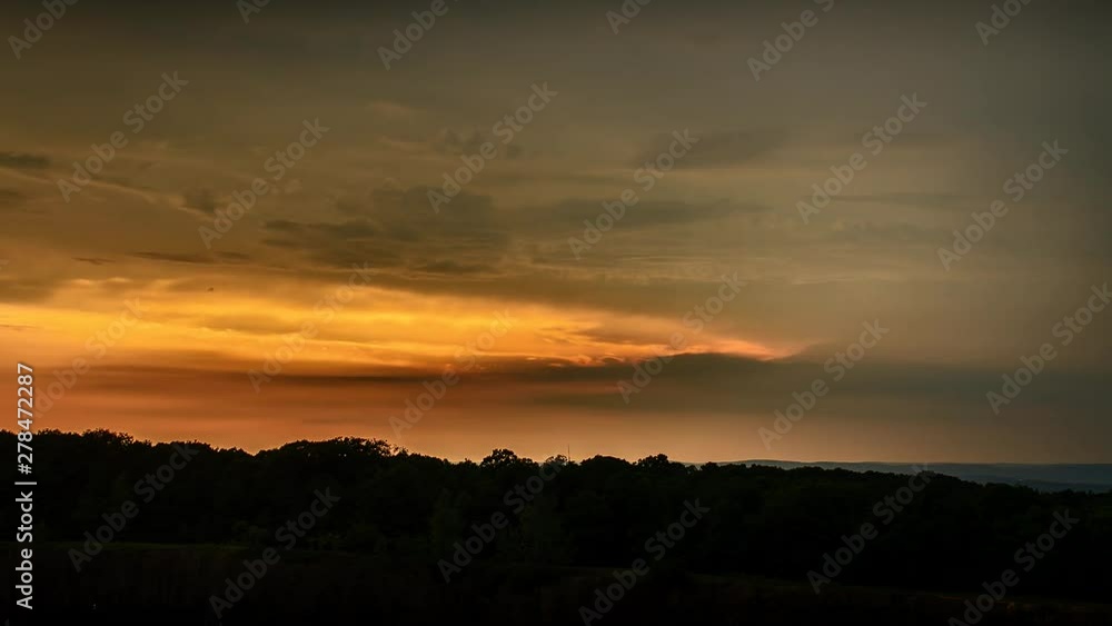 4K Time-lapse of the beautiful Summer Sunset in Northern New Jersey with rolling clouds. 4K Time-lapse of the beautiful Summer Sunset in Northern New Jersey with rolling clouds.