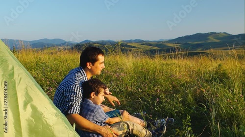 Wallpaper Mural Father And Little Son Looking Away Sitting At The Tourist Tent In The Mountains Torontodigital.ca