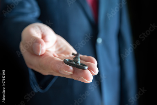 Businessman holding the old key. Business concepts