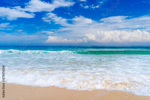 Beautiful tropical beach with blue sky and white clouds abstract texture background. Copy space of summer vacation and holiday business travel concept.