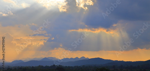 Panorama of dramatic ray of sunlight shines through the cloud with mountain view, Khaoyai, Thailand