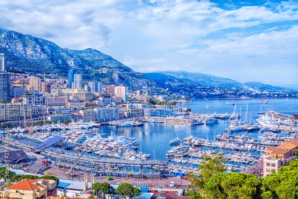 Cote d'Azur, Monte Carlo. Beautiful panoramic aerial view of harbor of Monaco with apartments and luxury yachts.