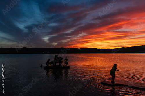 playing instruments on the lake