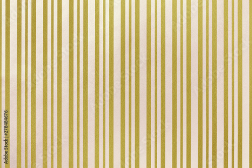 Golden and white background from wrapping striped paper.