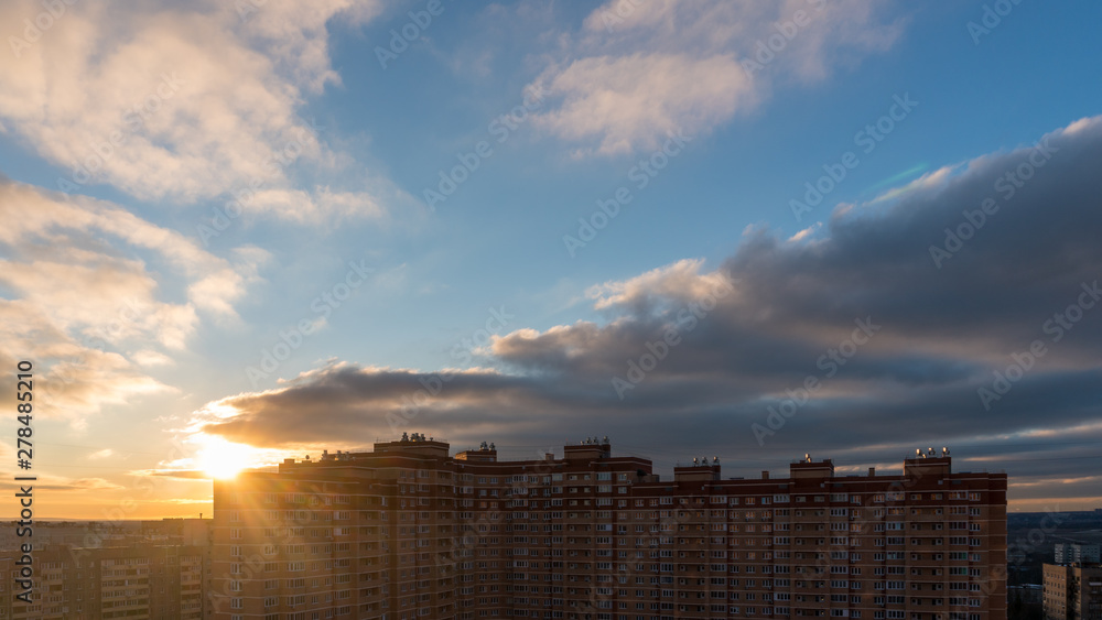 Sun rising over city Sun rising over city