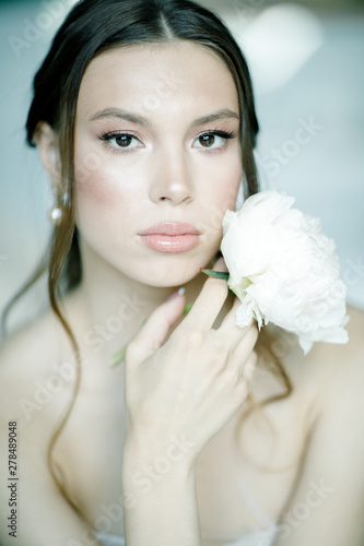 portrait of a beautiful bride with flower