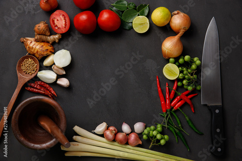 Thai kitchen. Various herbs, spices and Ingredients on dark background. Top view with copy space