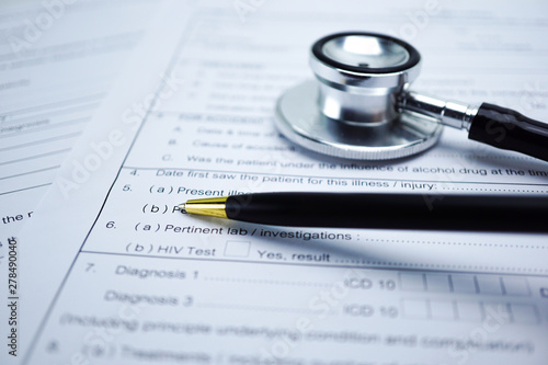 Health insurance accident claim form with stethoscope,  Medical concept.    