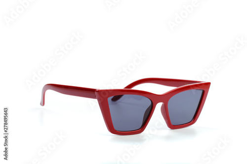 red modern sunglasses isolated on white background .