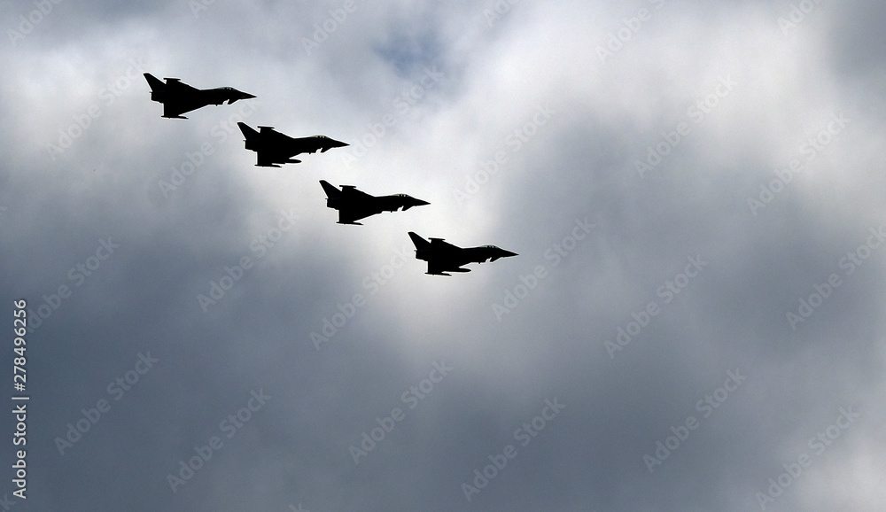 flight of four British typhoon fast jet air sueriority fighters. flight of four British typhoon fast jet air sueriority fighters.