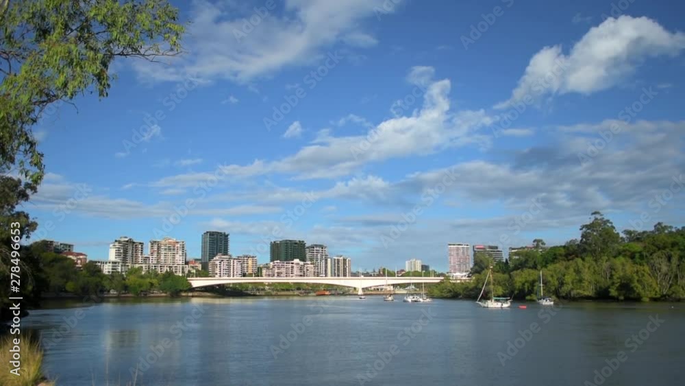 Beautiful, tranquil view up the Brisbane River towards the Captain Cook Bridge