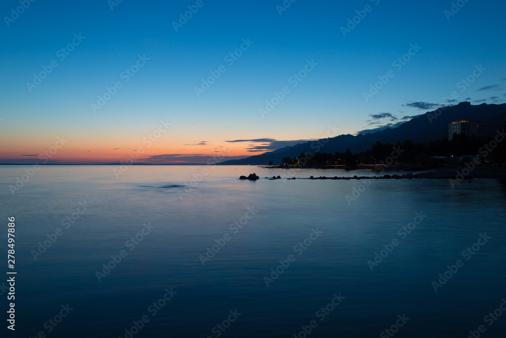 Sea and sky with clouds at sunset.