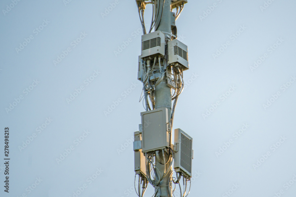 5g modern tv and smartphone telecommunication station antenna against the sky in the city 5g modern tv and smartphone telecommunication station antenna against the sky in the city