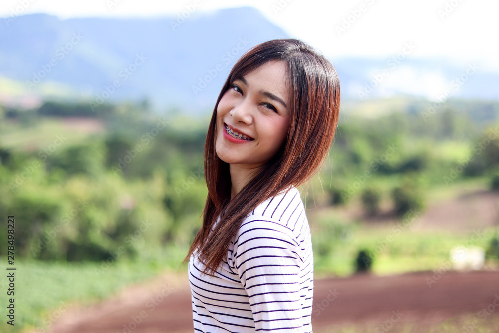 Beautiful asia woman with Mountain beautiful blue sky cloud in the winter,Travel and vocation concept. Beautiful asia woman with Mountain beautiful blue sky cloud in the winter,Travel and vocation concept.