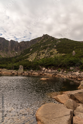 wild Sniezne Kotly glacial cirque with small lakes and rocks in Karkonosze mountains in Poland photo