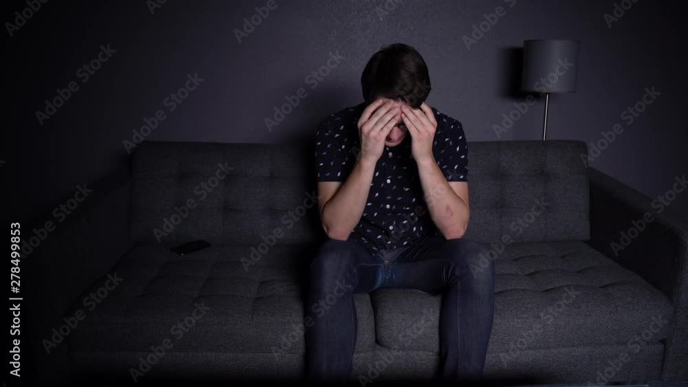 Caucasian Boy on Phone in Apartment Losing a Game and Rage Quitting Caucasian Boy on Phone in Apartment Losing a Game and Rage Quitting