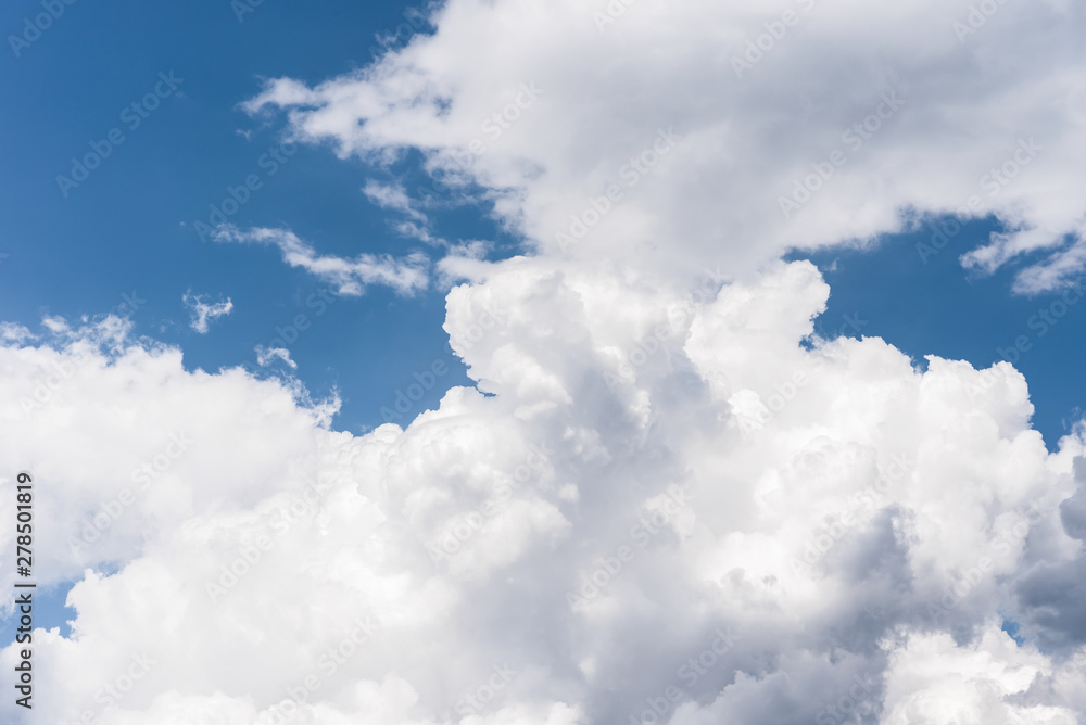 Blue sky background with a fluffy clouds Blue sky background with a fluffy clouds