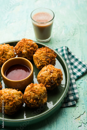 Crispy Noodles/maggie Pakora or pakoda is a popular indochinese street food served with ketchup