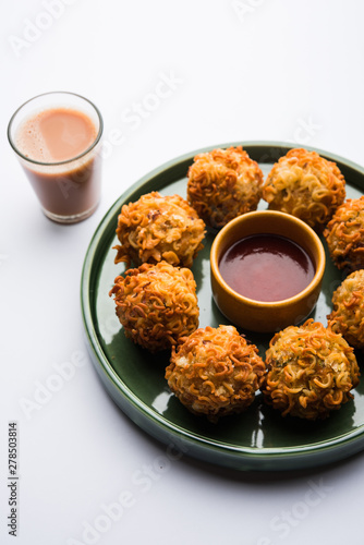 Crispy Noodles/maggie Pakora or pakoda is a popular indochinese street food served with ketchup