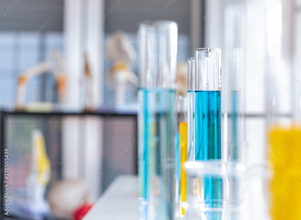 Test tube and scientist equipment in modern science laboratory Test tube and scientist equipment in modern science laboratory
