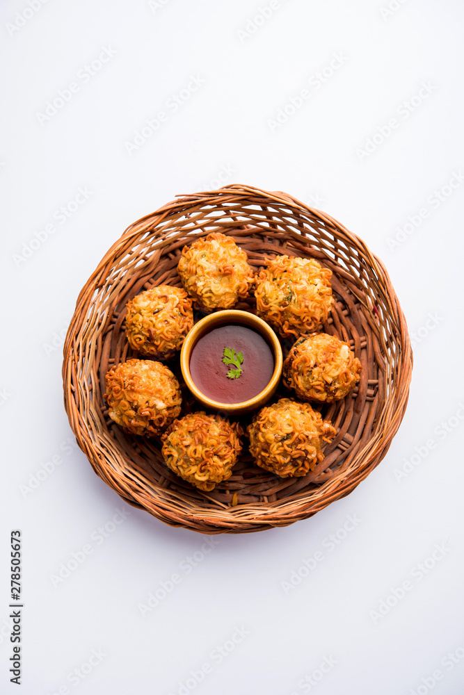 Crispy Noodles/maggie Pakora or pakoda is a popular indochinese street food served with ketchup