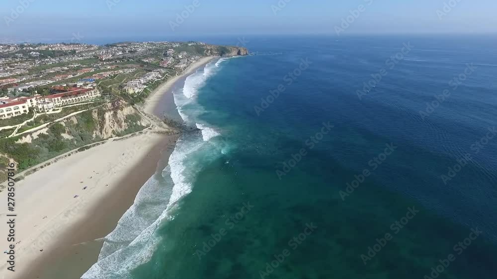 Aerial drone slowly flying over the ocean waves on Monarch Beach / Salt Creek Beach in Laguna Niguel, Orange County, California Aerial drone slowly flying over the ocean waves on Monarch Beach / Salt Creek Beach in Laguna Niguel, Orange County, California