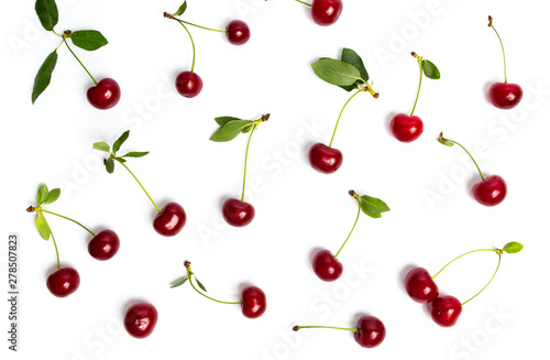 Raw cherry fruit on white flat lay