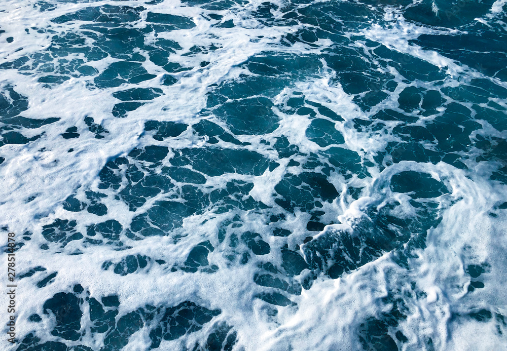 Restless movement of foam waves. Background of water in the sea. Restless movement of foam waves. Background of water in the sea.