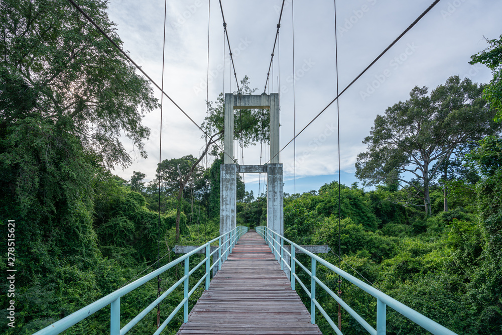 Obraz premium Beautiful of the longest suspension bridge in North eastern Region at Tana Rapids National Park,Ubonratchatani, Thailand
