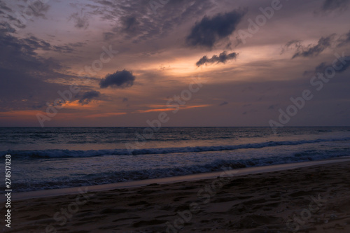 Orange sunset sky with cloud tropical area at Phuket Thailand.