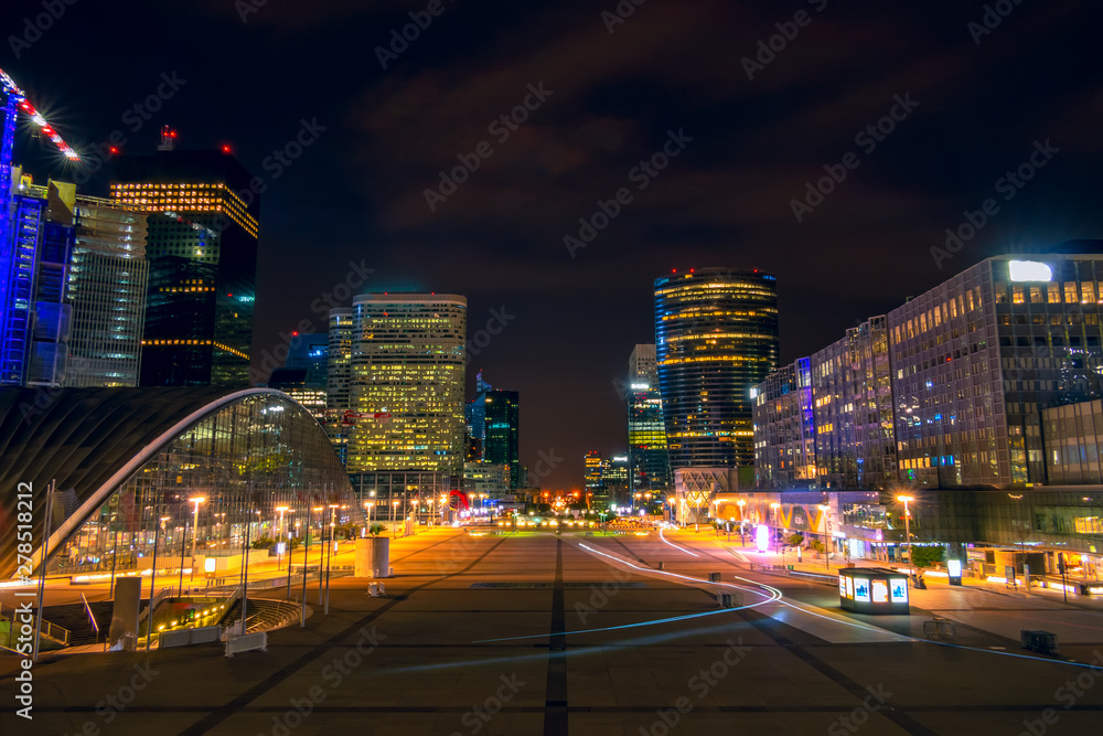 Night Pedestrian Square Surrounded by Skyscrapers