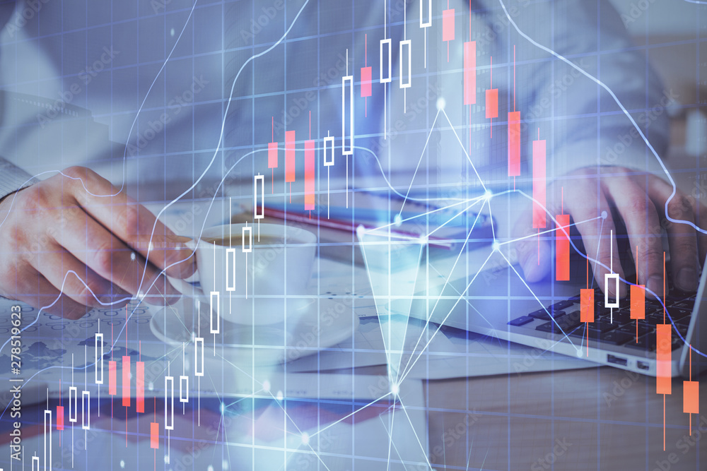 Forex graph with businessman working on computer in office on background. Concept of hardworking. Double exposure. Forex graph with businessman working on computer in office on background. Concept of hardworking. Double exposure.