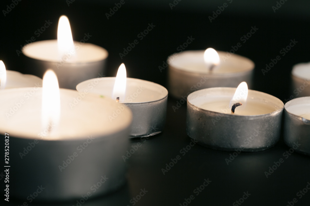Candles Burning at Night. White Candles Burning in the Dark Candles Burning at Night. White Candles Burning in the Dark
