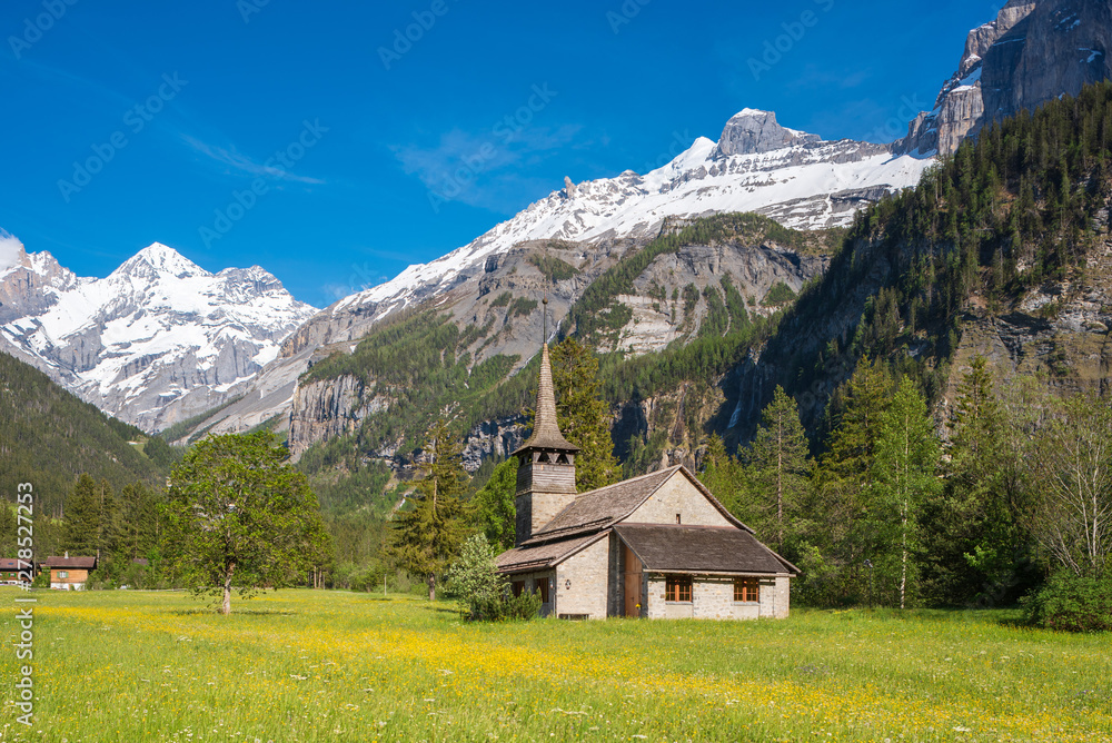 St. Marys Church with Bluemlisalp mountain close to Kandersteg