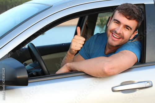 Driver showing satisfaction with hand gesture 