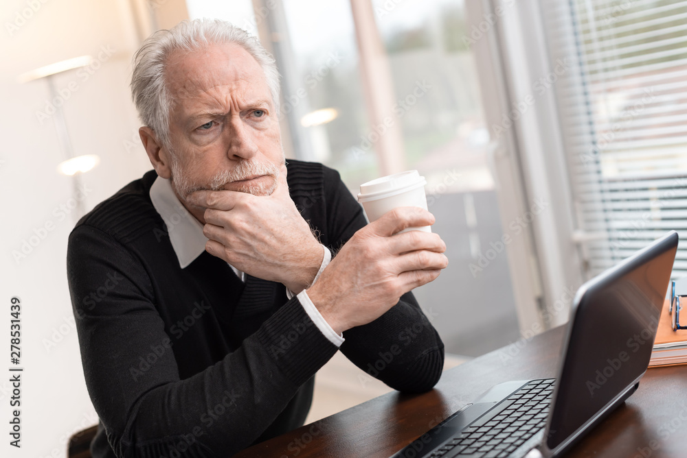 Portrait of thoughtful senior businessman Portrait of thoughtful senior businessman