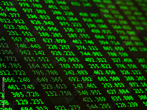 Wallpaper Mural Concept of Financial data on a monitor. Display of Stock market quotes on black background. Torontodigital.ca