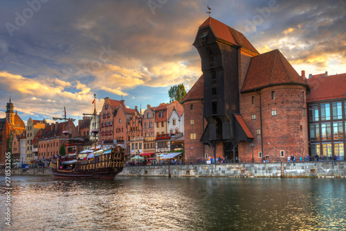 Beautiful port crane and the old town of Gdansk at sunset, Poland.