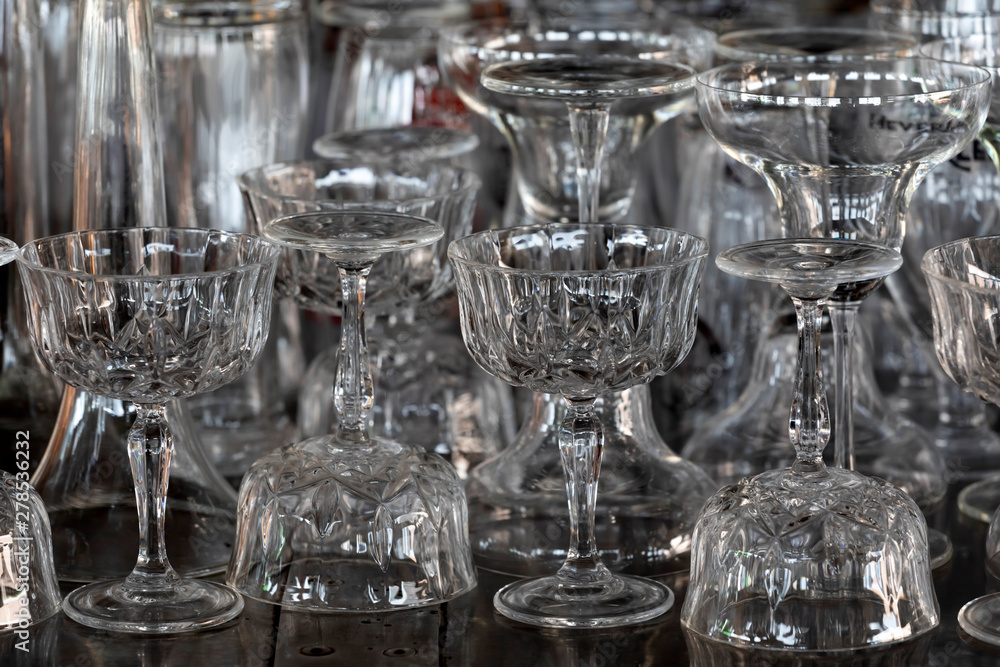 Glassware on a stainless steel hotel bar Glassware on a stainless steel hotel bar