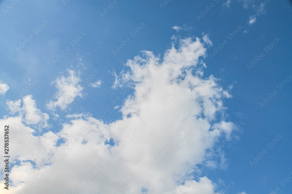 Obraz premium white clouds in the blue sky. background