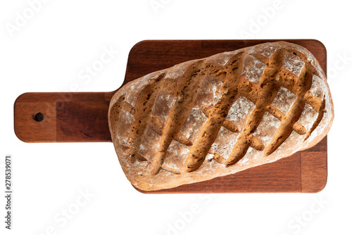 loaf of bread on cutting board isolated on white background